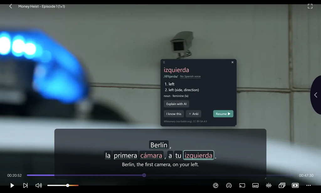 The Windows app over a paused video. The clicked Spanish word “izquierda” shows its meanings (“left”), that it is a feminine noun, and the buttons Explain with AI, I know this and Anki.